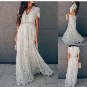 Brand new dress. Size XL. fits 12/14. Lace. Zipper back maxi dress